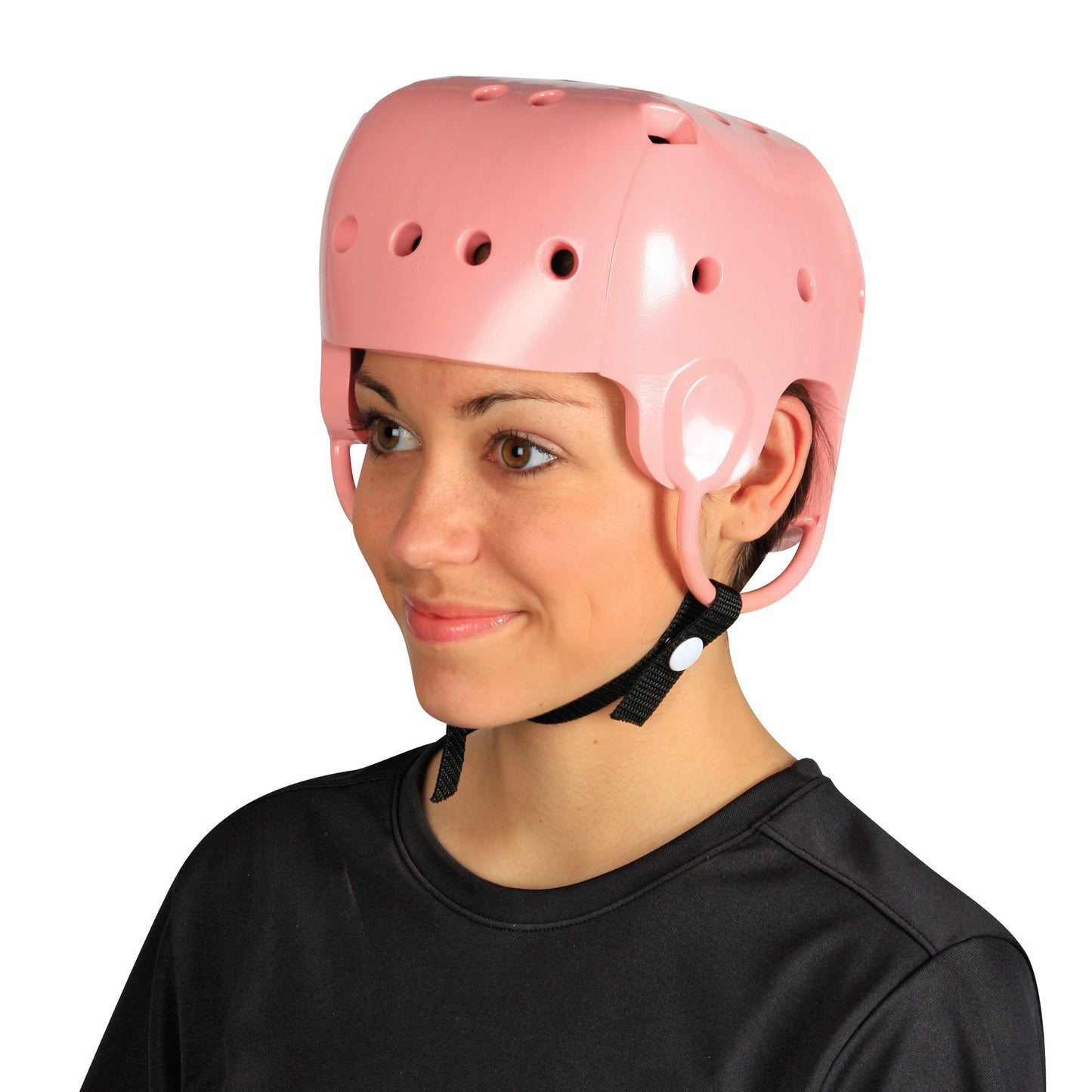 A person wears a pink Danmar Products Soft Shell Helmet with ventilation holes and a chin strap, paired with a black top.