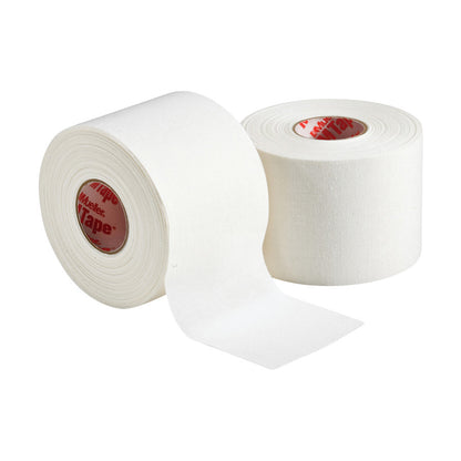 Two rolls of Mueller MTape Athletic Tape are shown. One roll is partially unrolled, displaying its white surface.
