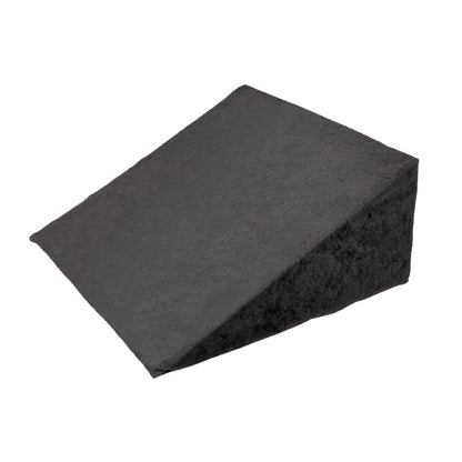 The AliMed Pelvic Wedge Positioner is a black wedge-shaped cushion designed for positioning and support, with a textured surface.