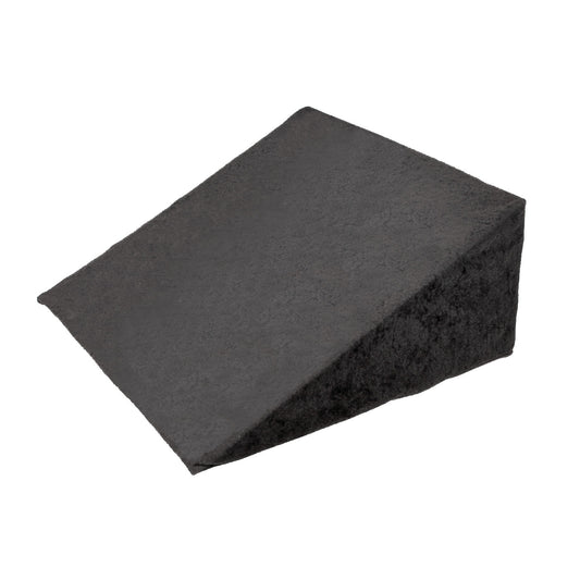 The AliMed Pelvic Wedge Positioner is a black wedge-shaped cushion designed for positioning and support, with a textured surface.