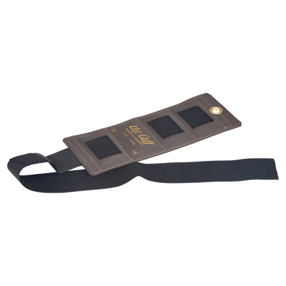 The image shows a brown AliMed Color-Coded Cuff Weight with black adjustable straps and three rectangular weight pockets.