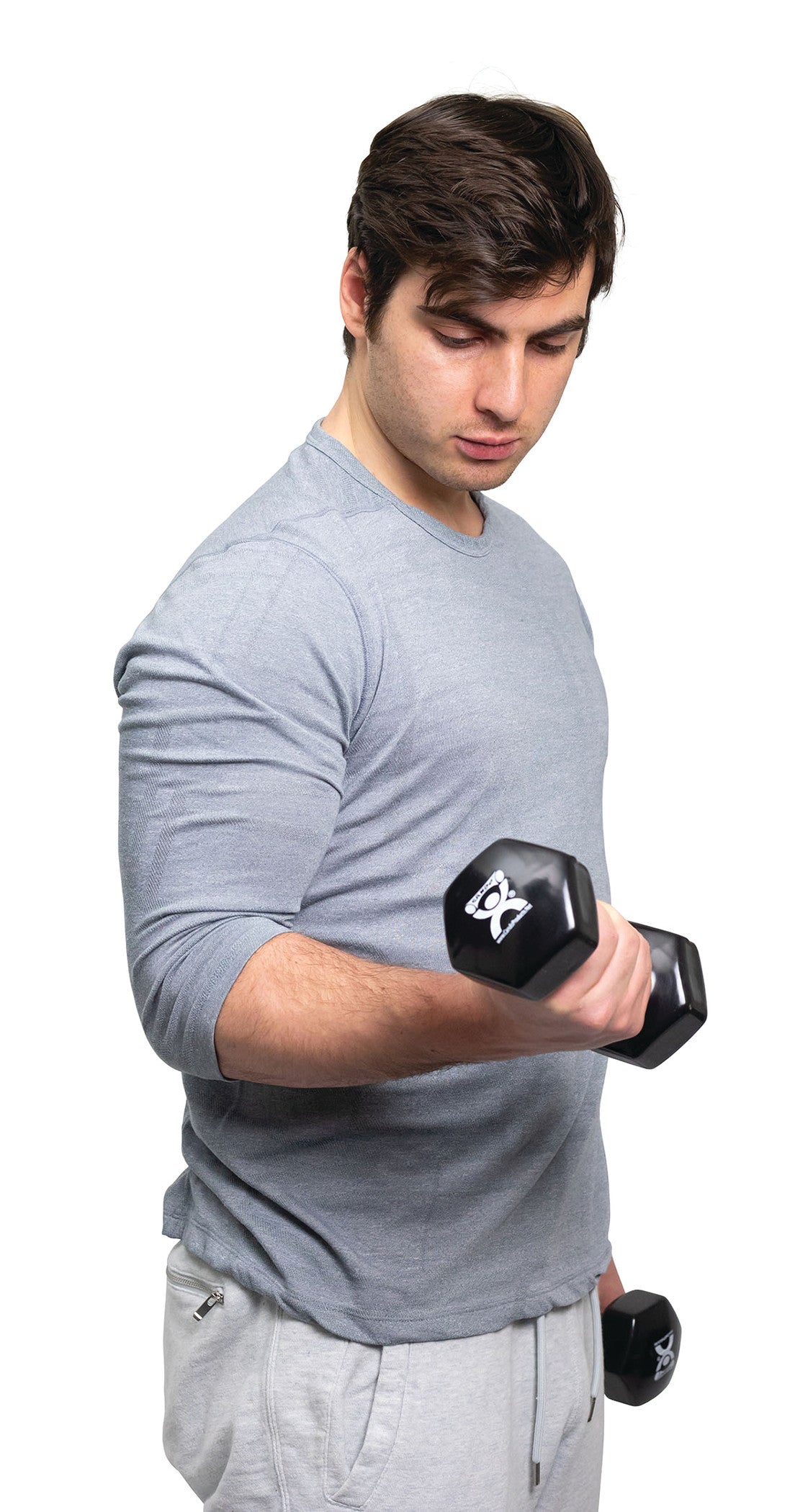 A person exercises with a CanDo Vinyl-Coated Dumbbell, wearing a gray shirt and pants. The dumbbell is black with a logo.