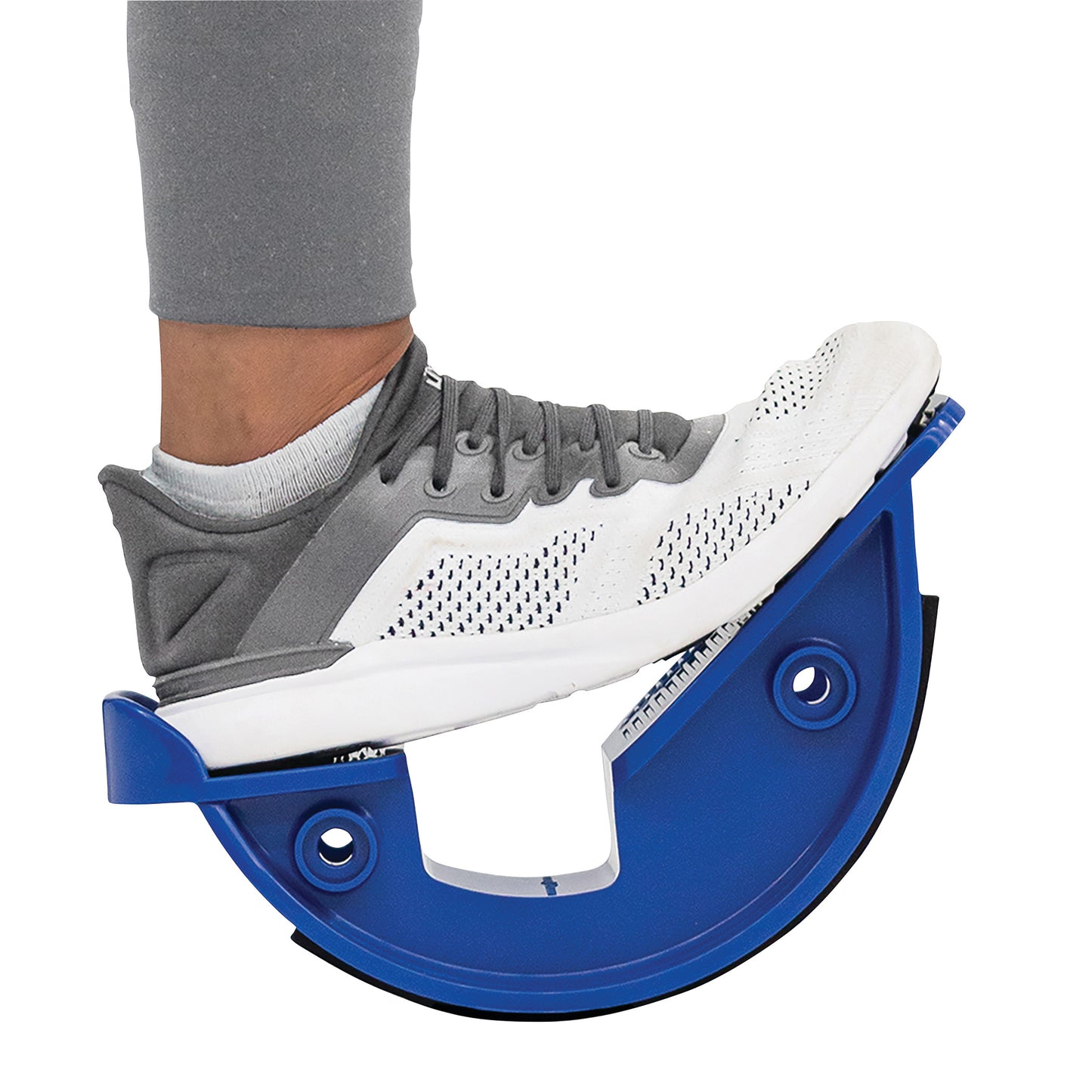 A person uses the Medi-Dyne ProStretch Calf and Foot Stretcher while wearing gray and white sneakers.