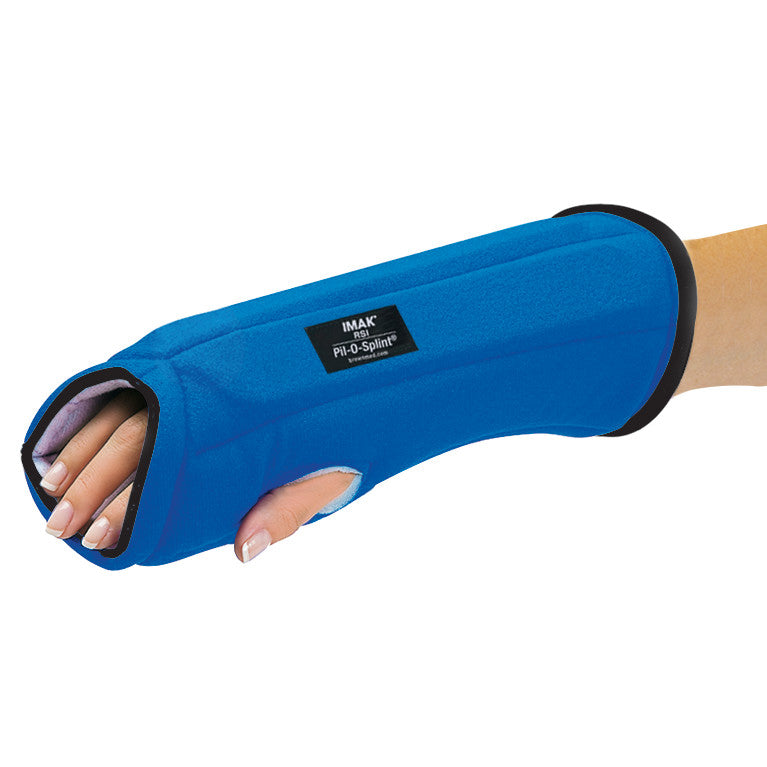 A hand wearing the Brownmed IMAK RSI Pil-O-Splint, a blue wrist and hand support brace with a black label on top.