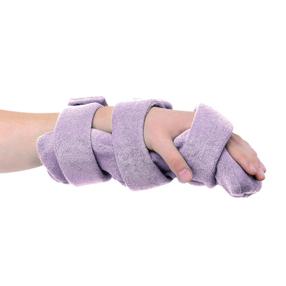 A hand wearing the Comfy Splints Pediatric Hand/Wrist Orthosis, wrapped in purple fabric with adjustable fasteners.