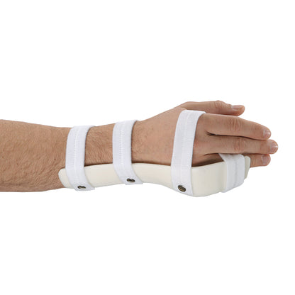 A hand wearing a G-Force Extended Length Boxers Splint with MP Flexion, secured by adjustable white straps on a beige plastic support.