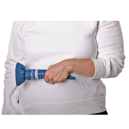 A person in a white shirt holds a Replacement Carrot for AliMed Antimicrobial-Treated Blue Therapy Carrot Hand Contracture Orthosis Kit.