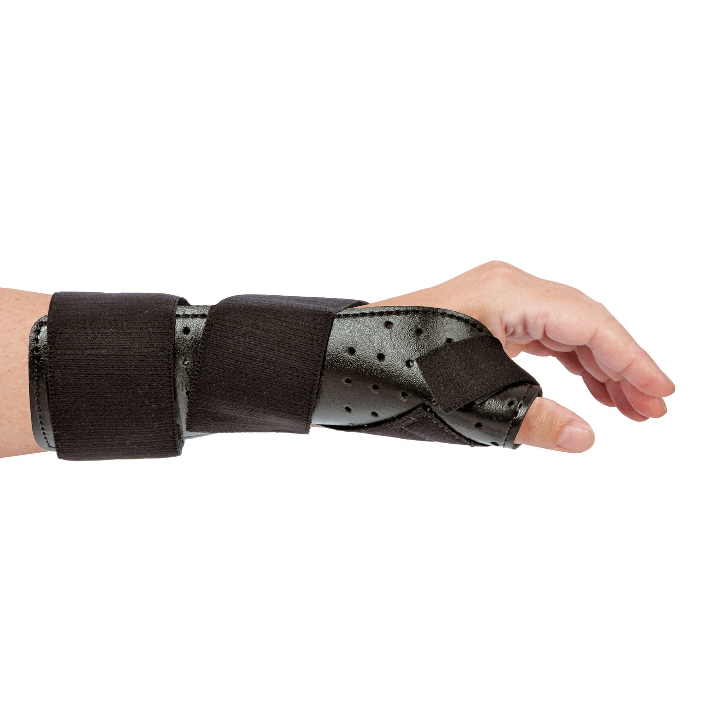 A hand wears an AliMed FREEDOM Thumb Spica, a black wrist and thumb support brace with adjustable straps for stabilization.
