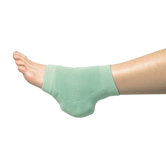 A person wears a mint green Heelbo Heel/Elbow Protector on their foot, providing cushioning and support to the heel area.