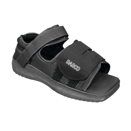 A black DARCO MedSurg Shoe with adjustable straps and a thick sole, designed for post-operative or injured foot support.