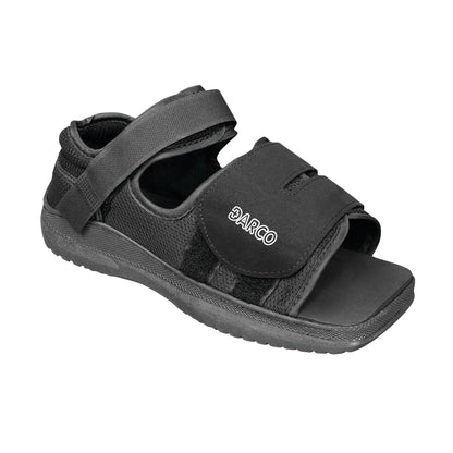The image features a DARCO MedSurg Shoe, a black medical sandal with adjustable straps for post-operative foot care.