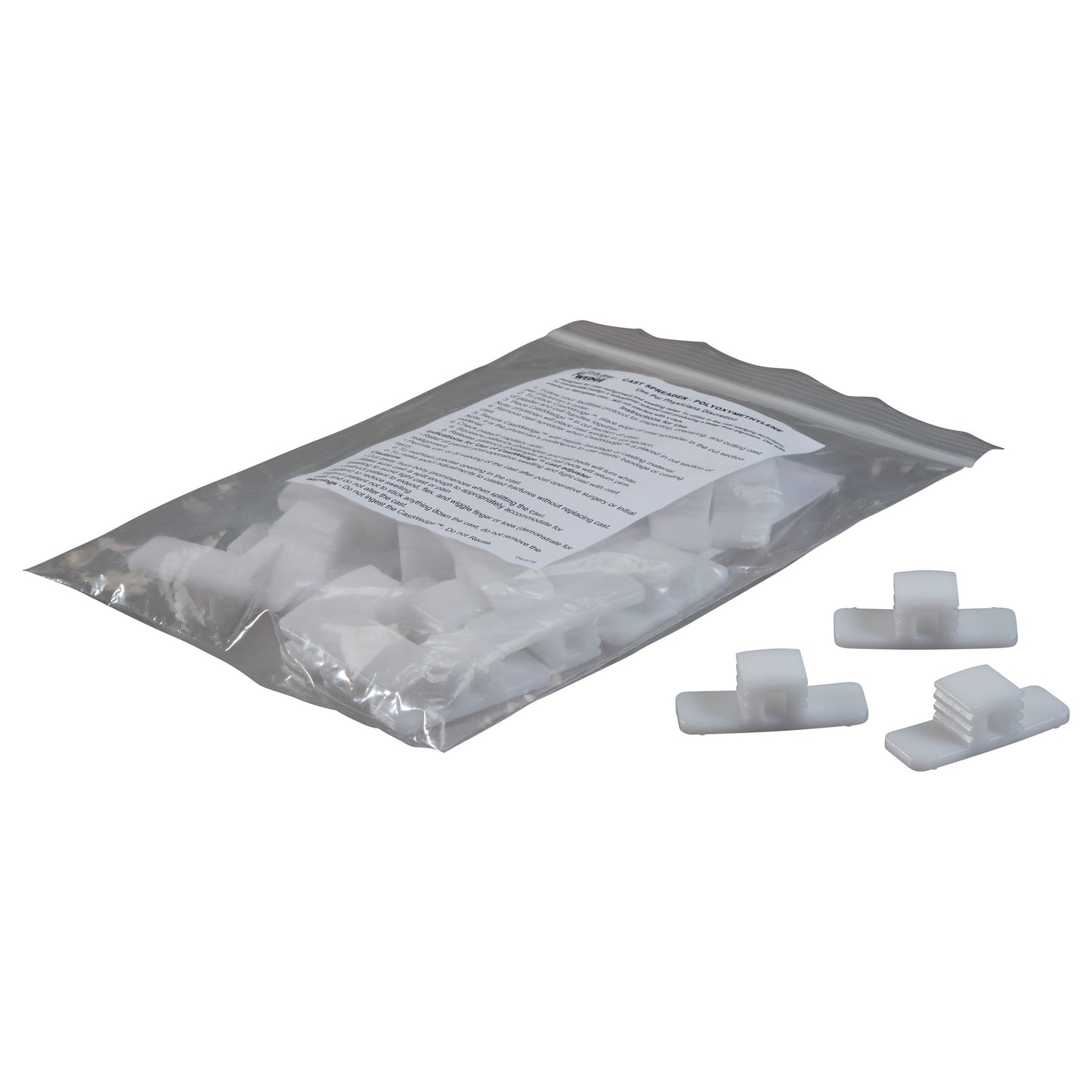 A sealed plastic bag containing Replacement Wedge for CastWedge Starter Set. Three white wedges are displayed outside the bag.