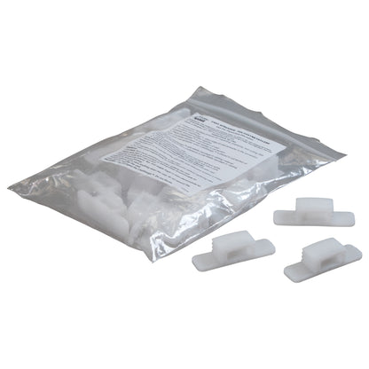 A clear bag containing multiple Replacement Wedges for CastWedge Starter Set, with three wedges displayed outside the bag.