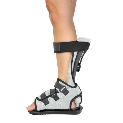 A leg wearing the AliMed MultiBoot X-Cel Contracture Boot with Synthetic Fleece Liner, secured with adjustable straps.