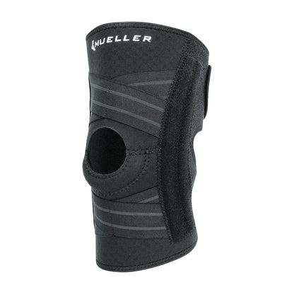 The Mueller Self-Adjusting Knee Stabilizer is a black brace with adjustable straps and a circular kneecap opening for support.