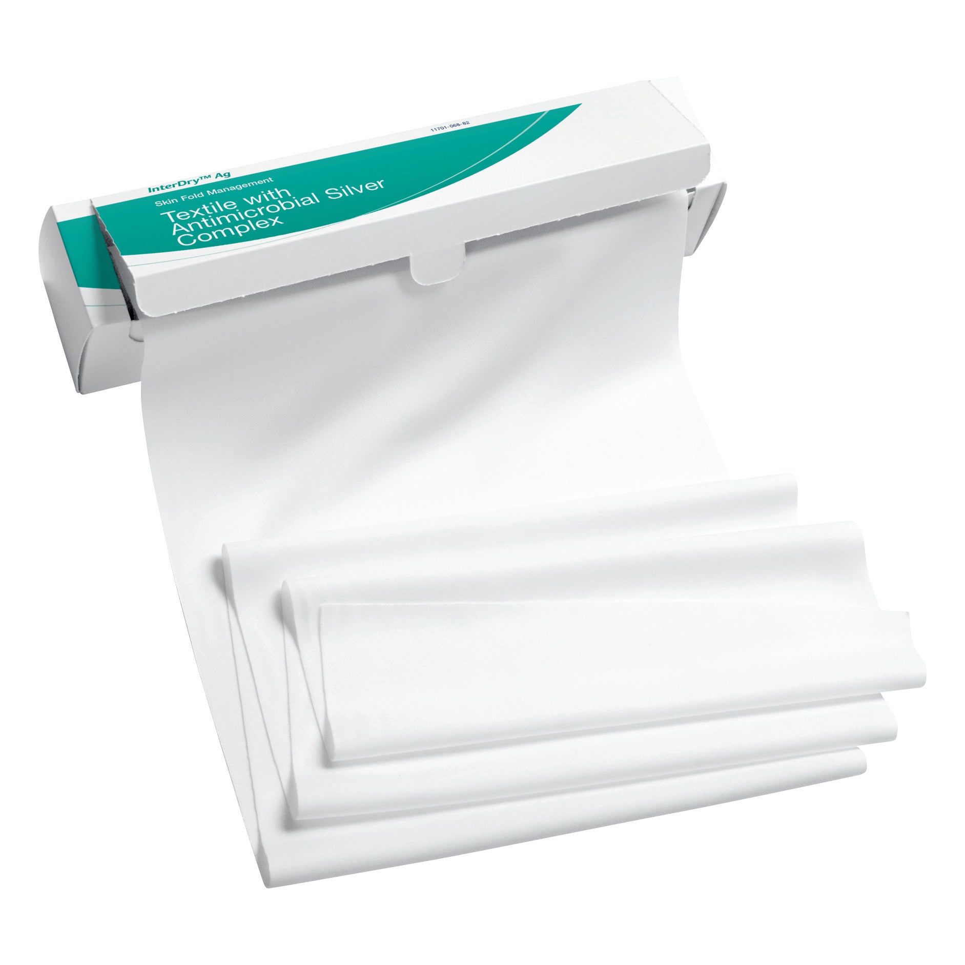Coloplast InterDry Ag Textile with Antimicrobial Silver Complex partially pulled from its white and green box, displaying folded layers.