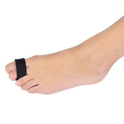 A foot wearing a Silipos Gel Splint on the big toe against a white background. The splint is black and supports the toe.