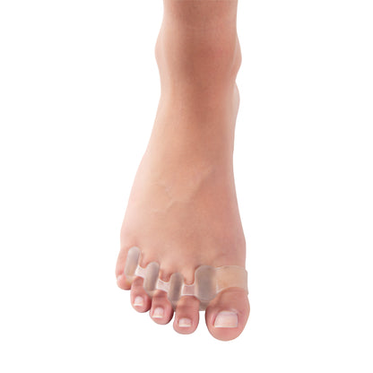 A foot wearing the PediFix Visco-GEL 5-ToeBuddy, a clear gel toe separator designed to align and cushion all five toes.