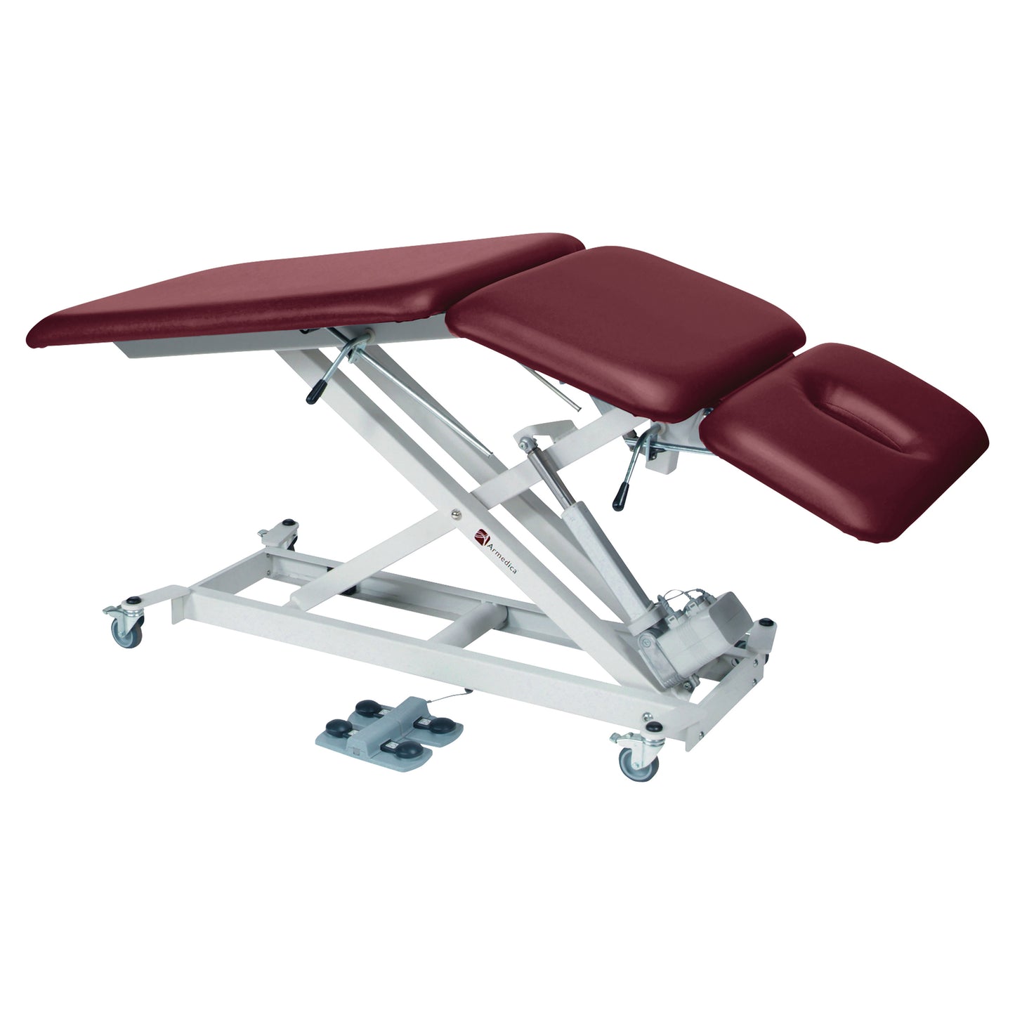 Armedica AM-SX3000 Treatment Table with burgundy cushions and adjustable sections on a white steel frame with wheels.