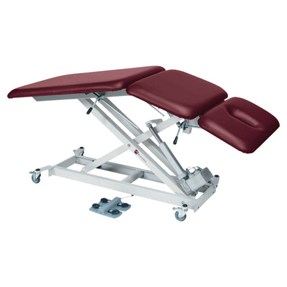Armedica AM-SX3000 Treatment Table with burgundy cushions and adjustable sections on a white steel frame with wheels.