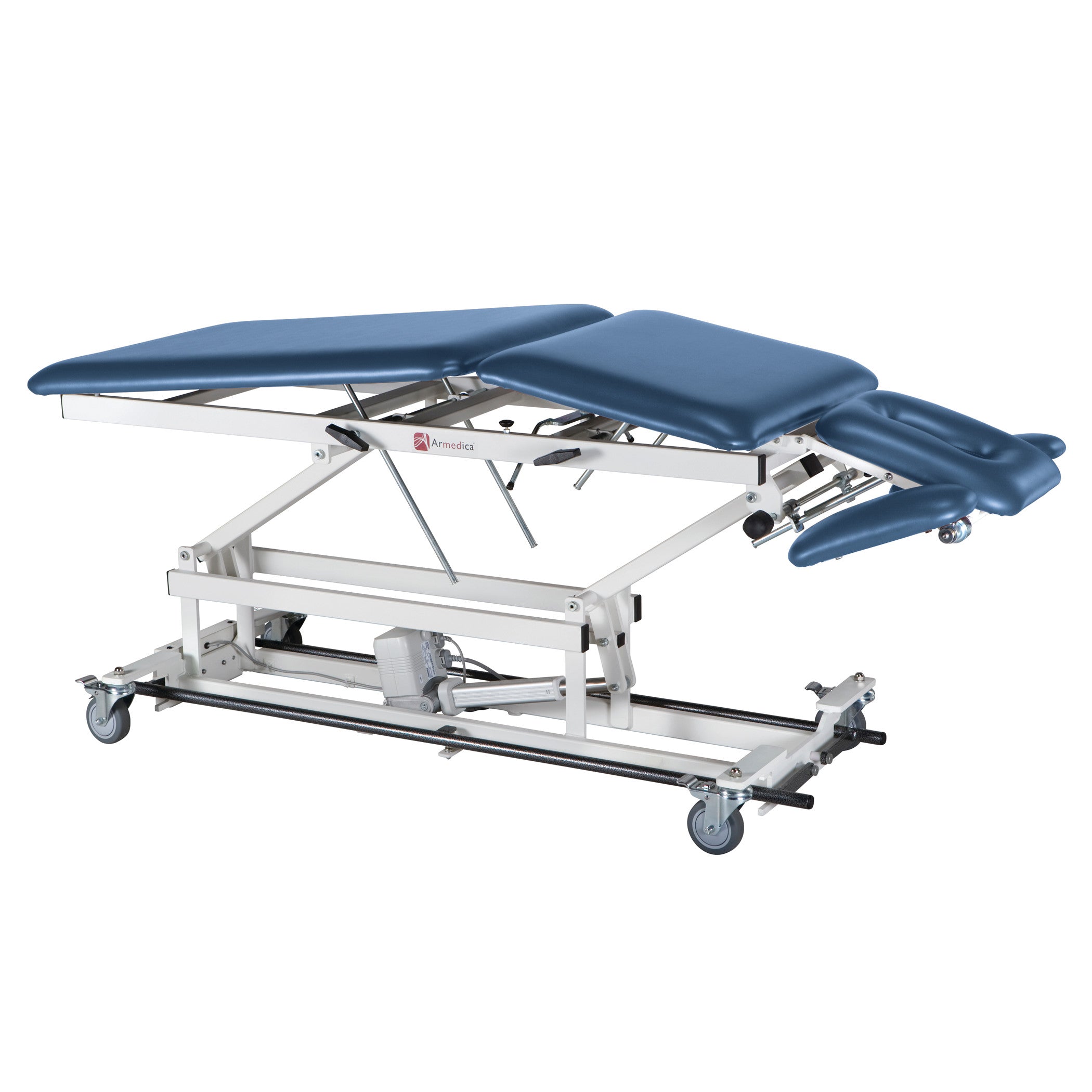 The Armedica AM-BA500 Treatment Table is an adjustable, blue-cushioned medical bed with wheels and a white metal frame.