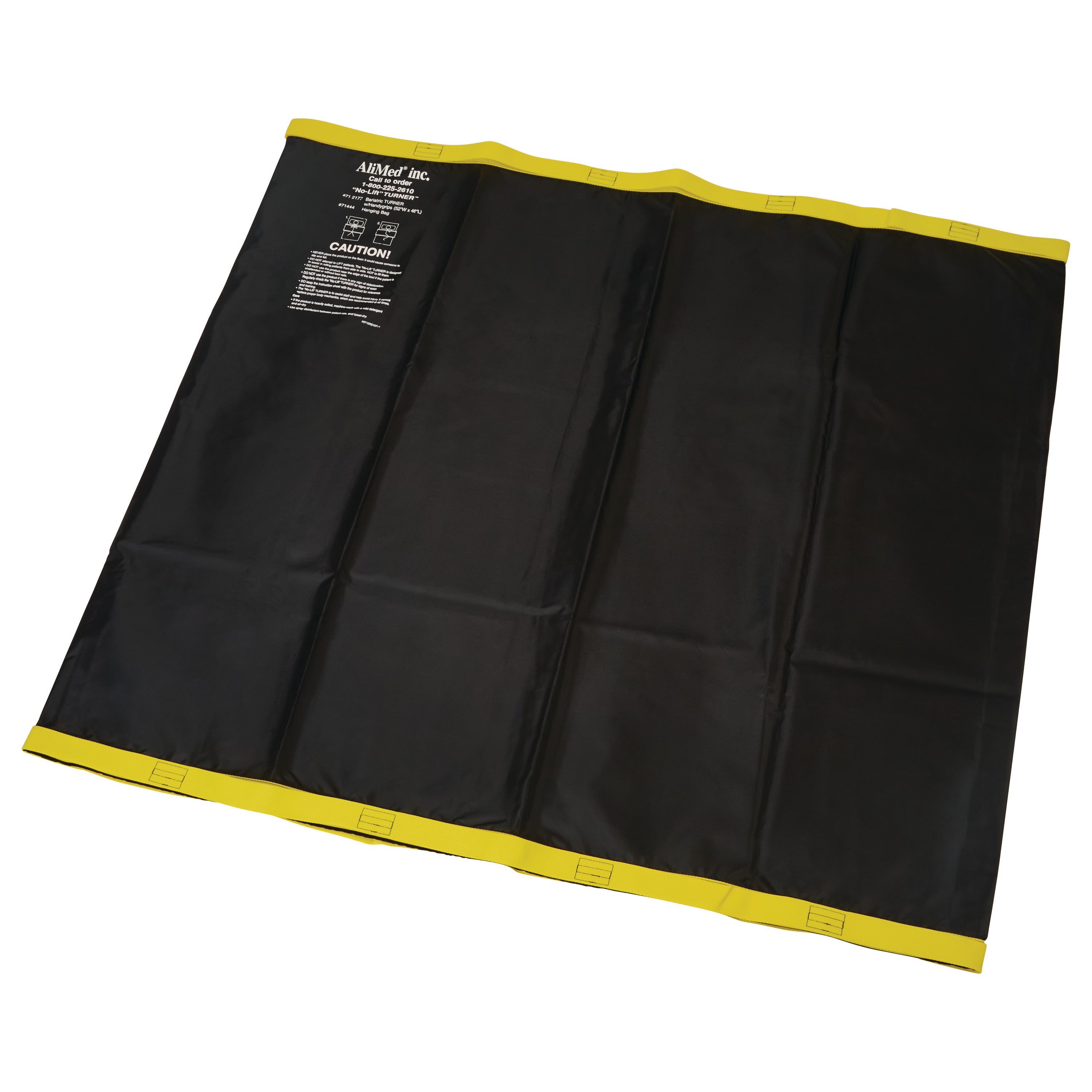 The AliMed No-Lift TURNER is a black and yellow transfer sheet with handles and caution instructions printed on it.