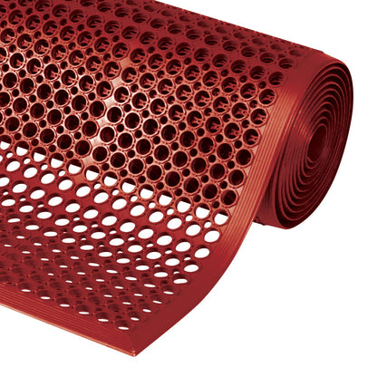 A rolled-up red Sanitop Drainage Anti-Fatigue Mat with circular holes for drainage and comfort.