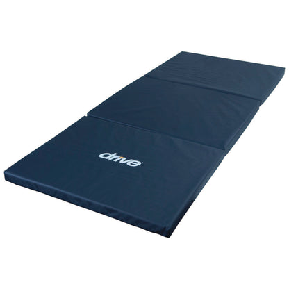 Drive Medical Tri-Fold Bedside Fall Mat in navy blue, folded into three sections with the word \"drive\" printed on one section.