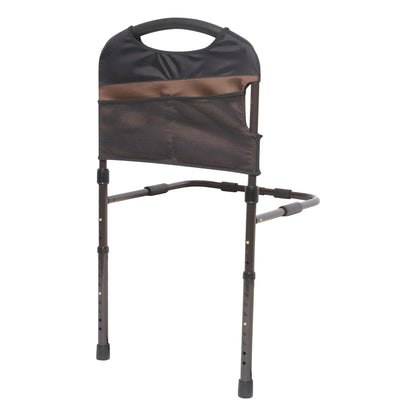 Stander Stable Rail, a bed support device with adjustable legs and a handle, features a black mesh pocket for storage.