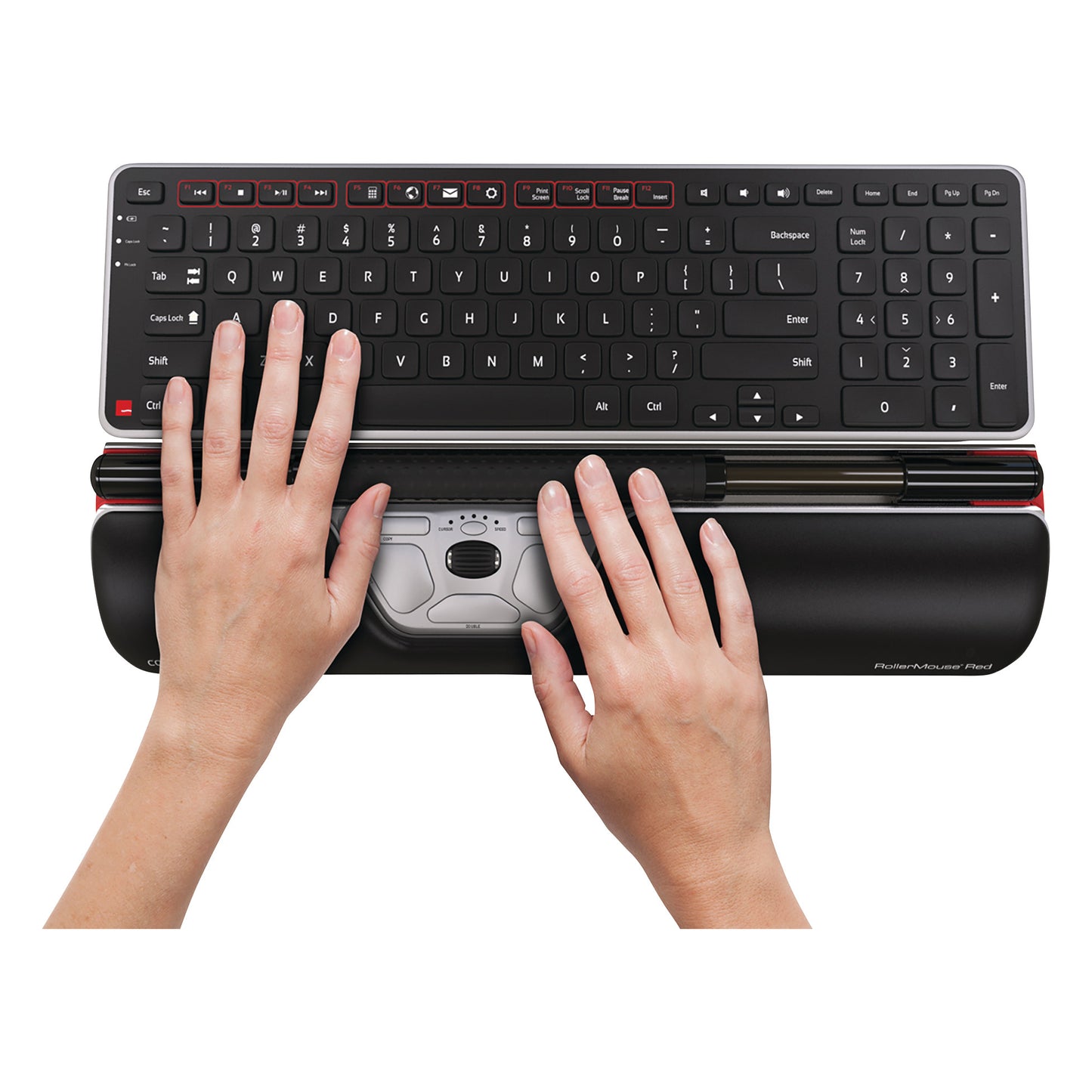 Hands use a Contour RollerMouse Red with an integrated keyboard and roller bar for ergonomic control and comfort.