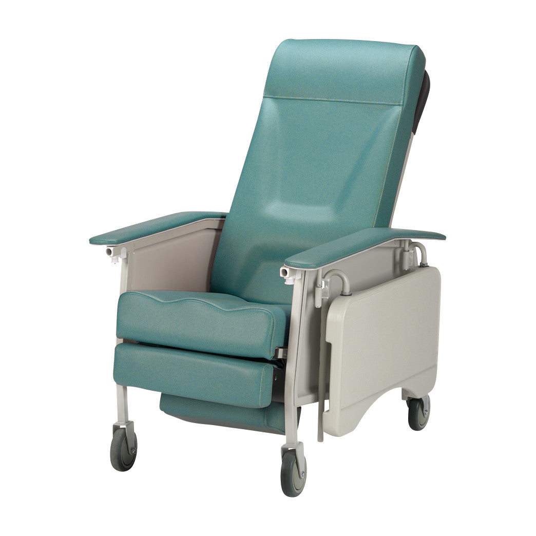 The Invacare Deluxe Geri-Chair is a teal recliner with padded armrests, a leg rest, and wheels for mobility.