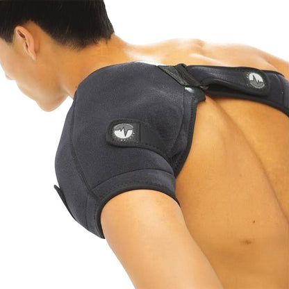 A person wearing an ActiveWrap shoulder support, designed in black fabric, covering the upper shoulder and upper back.