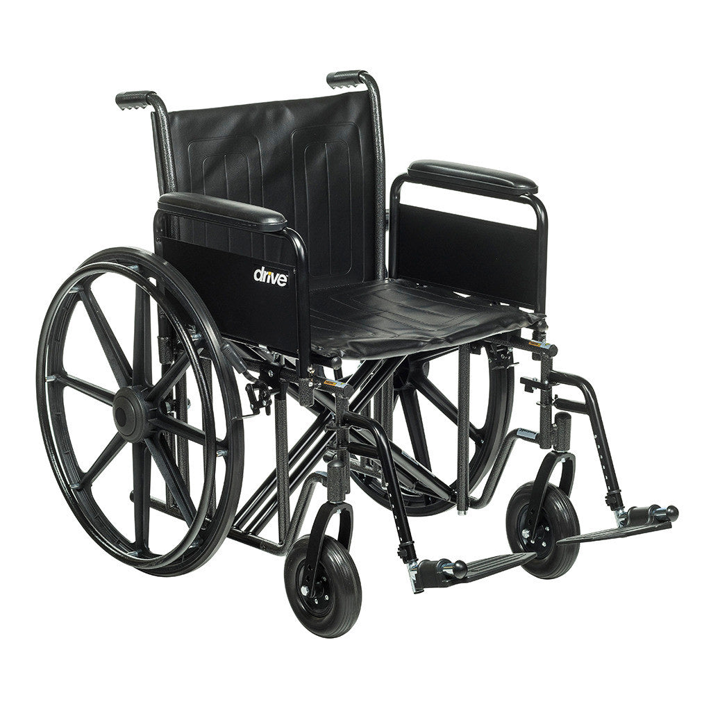 Drive Medical Sentra EC Heavy-Duty Wheelchair with Full Arms and Swing-Away Footrests, featuring a black seat and large wheels.