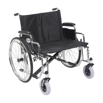 Drive Medical Sentra EC Heavy-Duty Extra-Wide Wheelchair with black seat, chrome frame, and large rear wheels.