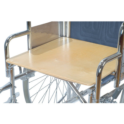 A wheelchair with an AliMed Wheelchair Board mounted on the armrests, providing a flat wooden surface over the seat.