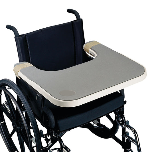 A wheelchair with an Economy Molded Tray attached, featuring a contoured shape and beige edging.