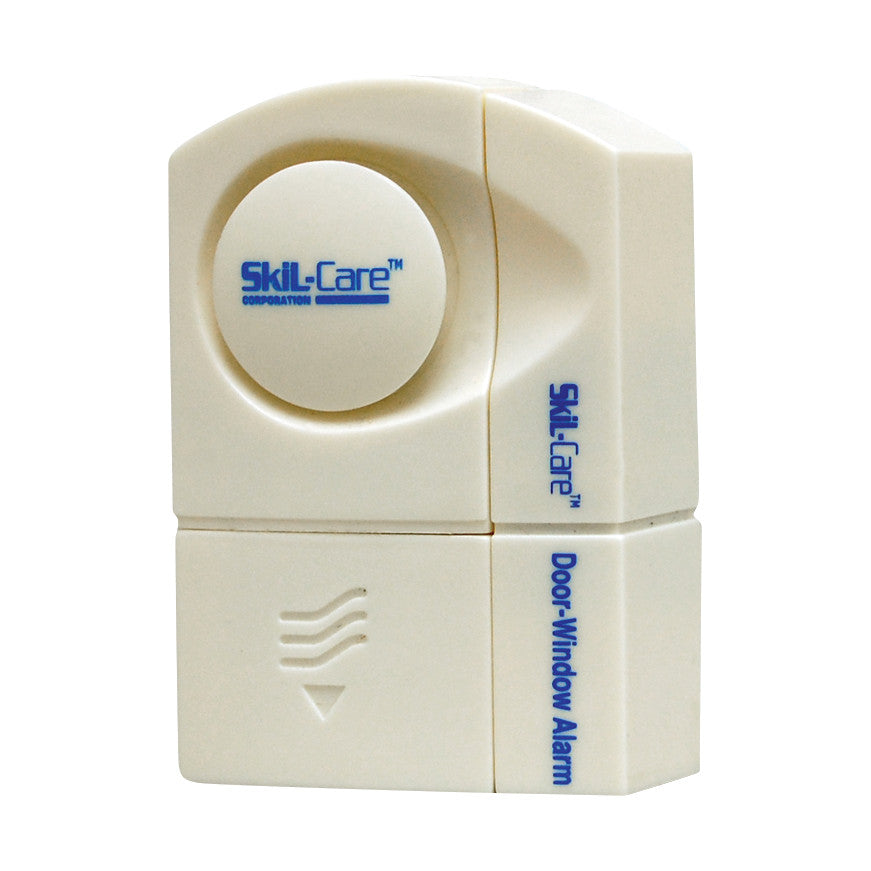 The image shows the SkiL-Care Door/Window Alarm, a small beige device with a round button and text indicating its function.