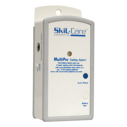 The SkiL-Care MultiPro Safety Alarm is a rectangular device with buttons for auto reset and battery test, used for monitoring safety.