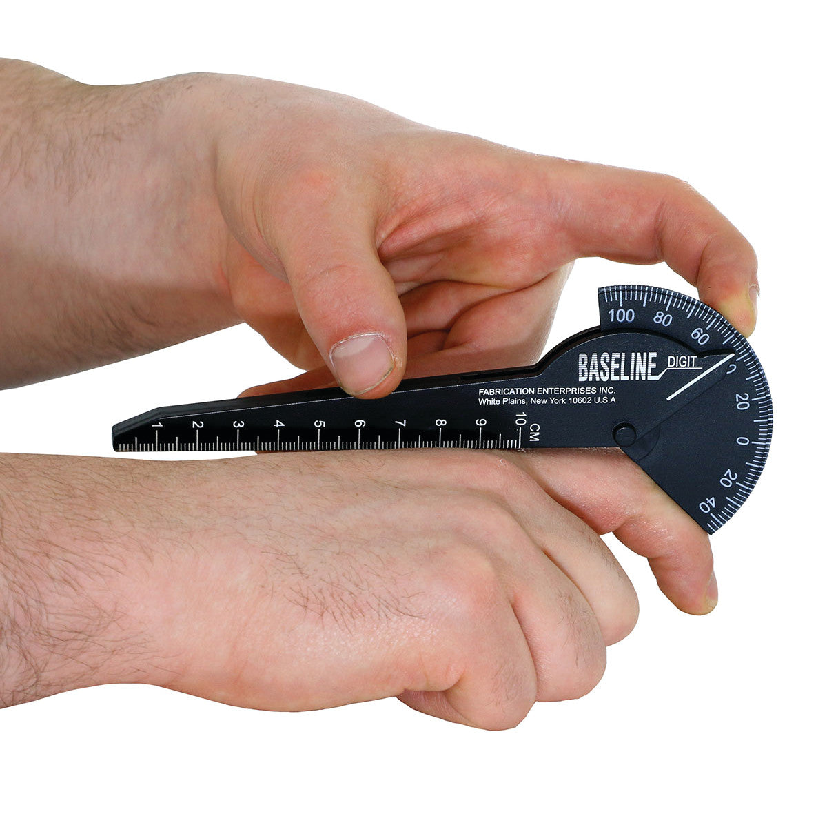 A person using a Baseline Digit Goniometer to measure wrist joint angles. The black device features a protractor and ruler.