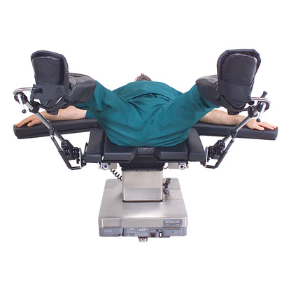 A person in teal medical scrubs lies on a surgical table with legs elevated in Replacement Clamshell Boot for Allen Ultrafin Stirrup.