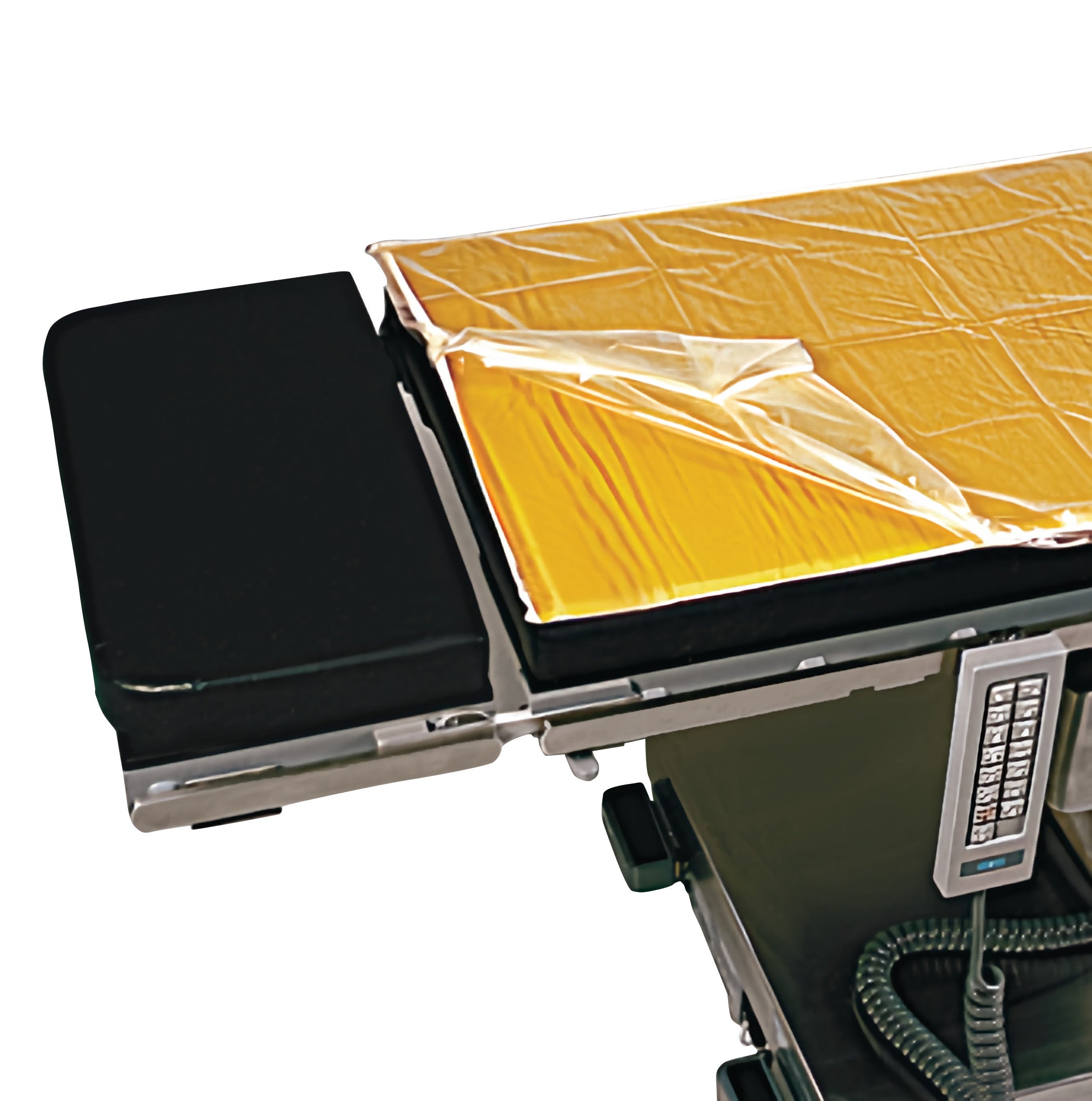 An operating table with an AliMed Disposable Fitted Sheet Style Cover Set for Gel Surface Overlays, featuring a plastic protective layer.