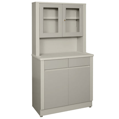 UMF Wide Treatment Cabinet in gray with a countertop, two upper glass doors, and two lower solid doors with a pair of drawers above.