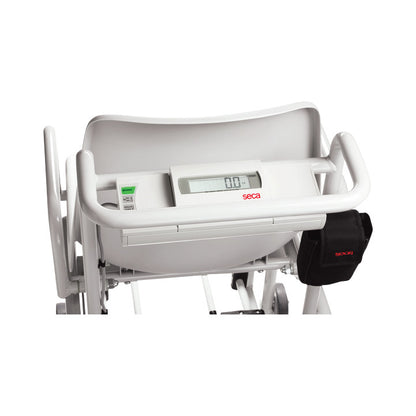 The seca 954 Chair Scale features a digital display and a seat, designed for weighing patients with limited mobility.