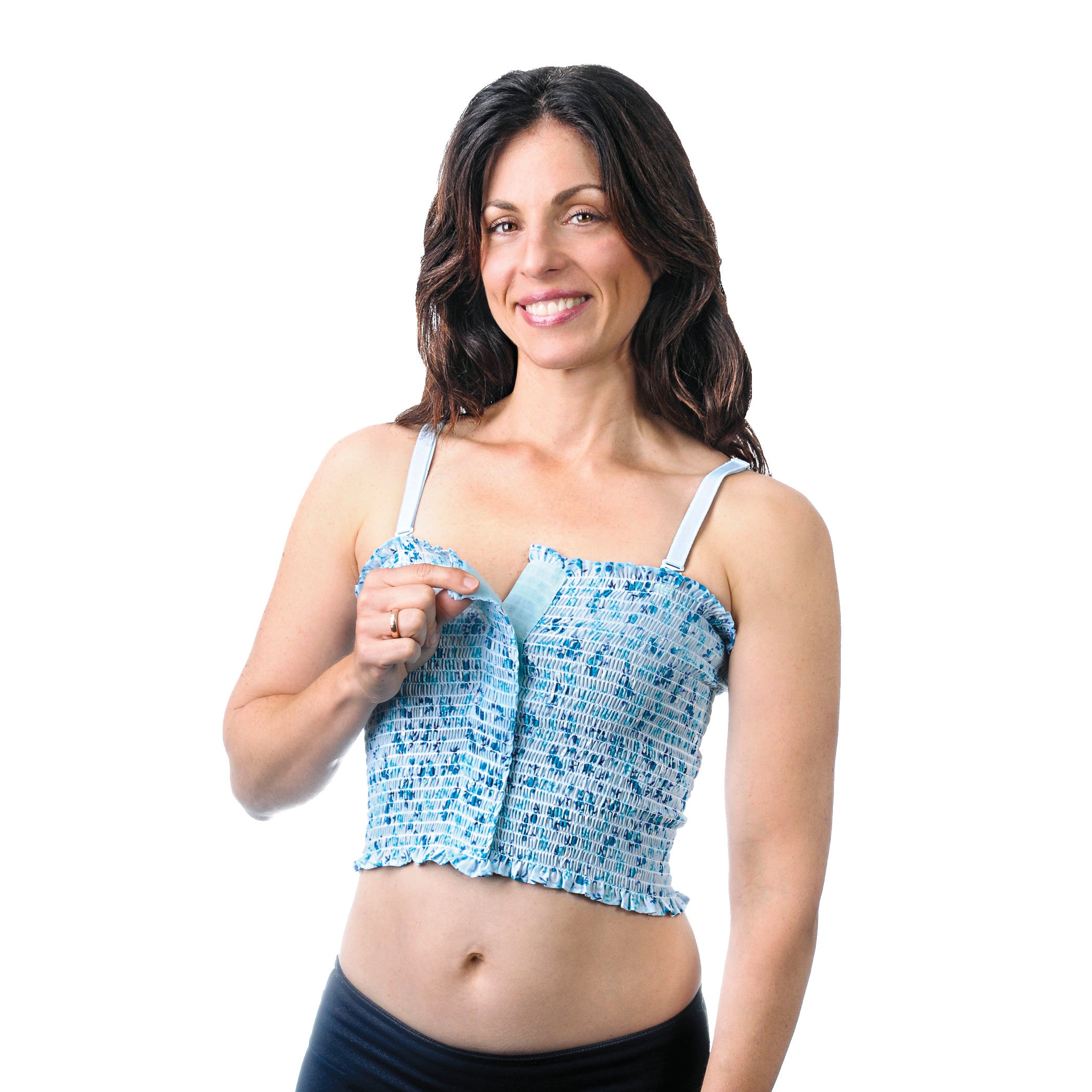 A smiling woman wears an Expand-A-Band Lined Breast Binder, 12/Pack, with a blue patterned design and adjustable straps.