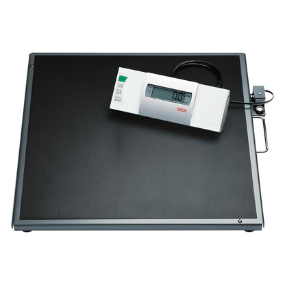 seca 634 Flat Scale with Extra-Large Platform features a digital display for weight measurement, with a large black platform.