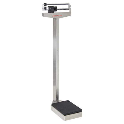 A DETECTO Mechanical Balance Beam Scale with a tall metal beam, sliding weights, and a black platform for weighing individuals.
