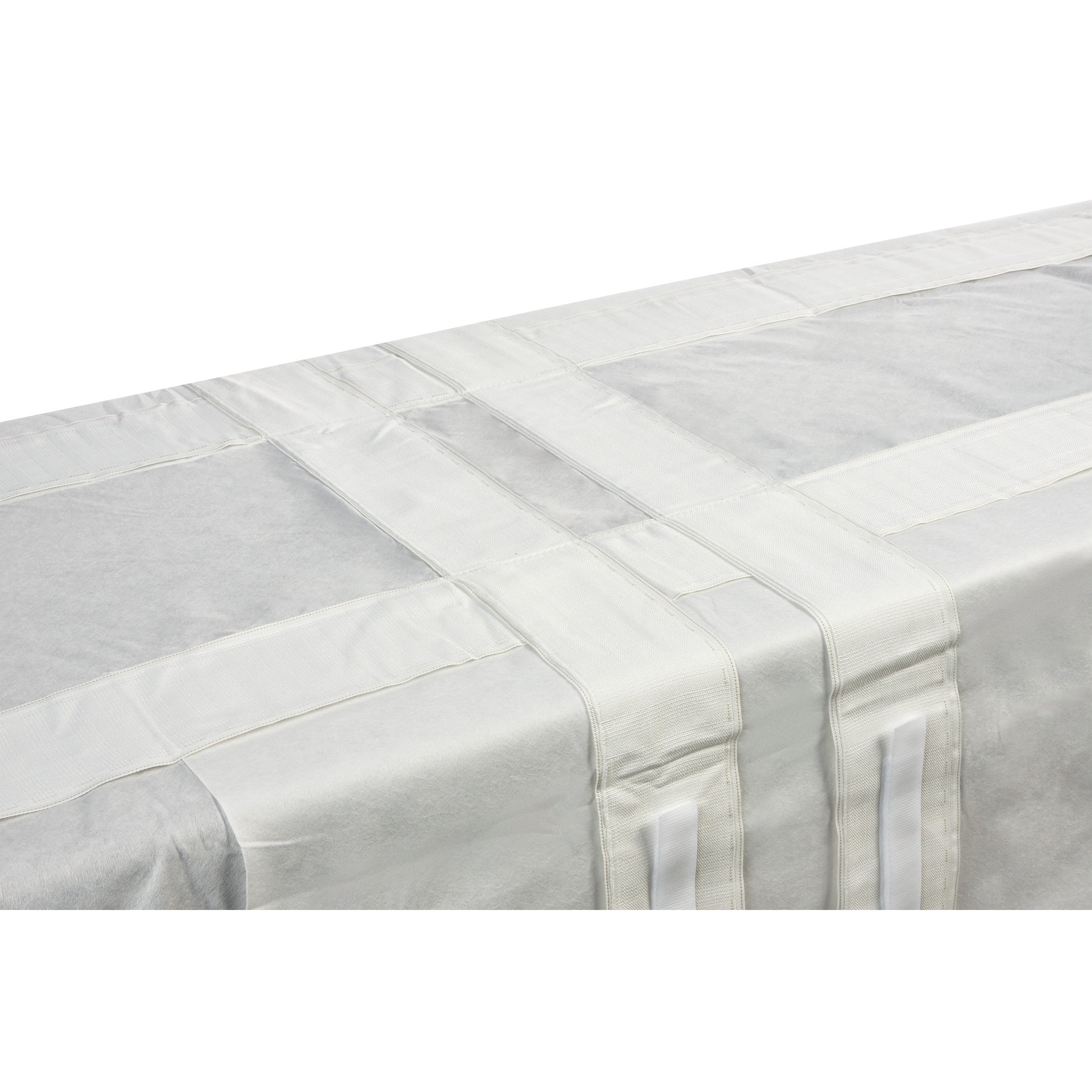 AliMed Trendelenburg Stabilizer on a table, featuring white straps and panels, designed for surgical positioning support.