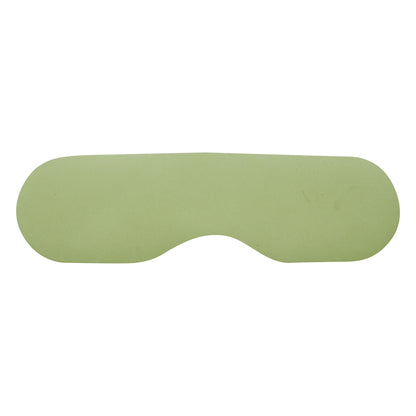 SecureShield CT Eye Shield, green, rectangular with oval ends, designed for patient eye protection during medical imaging procedures.
