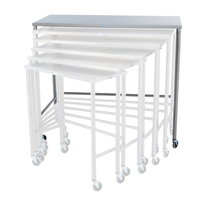 A set of Blickman Nested Instrument Tables, Single Table, nesting into one another on rolling casters with white frames and gray tops.