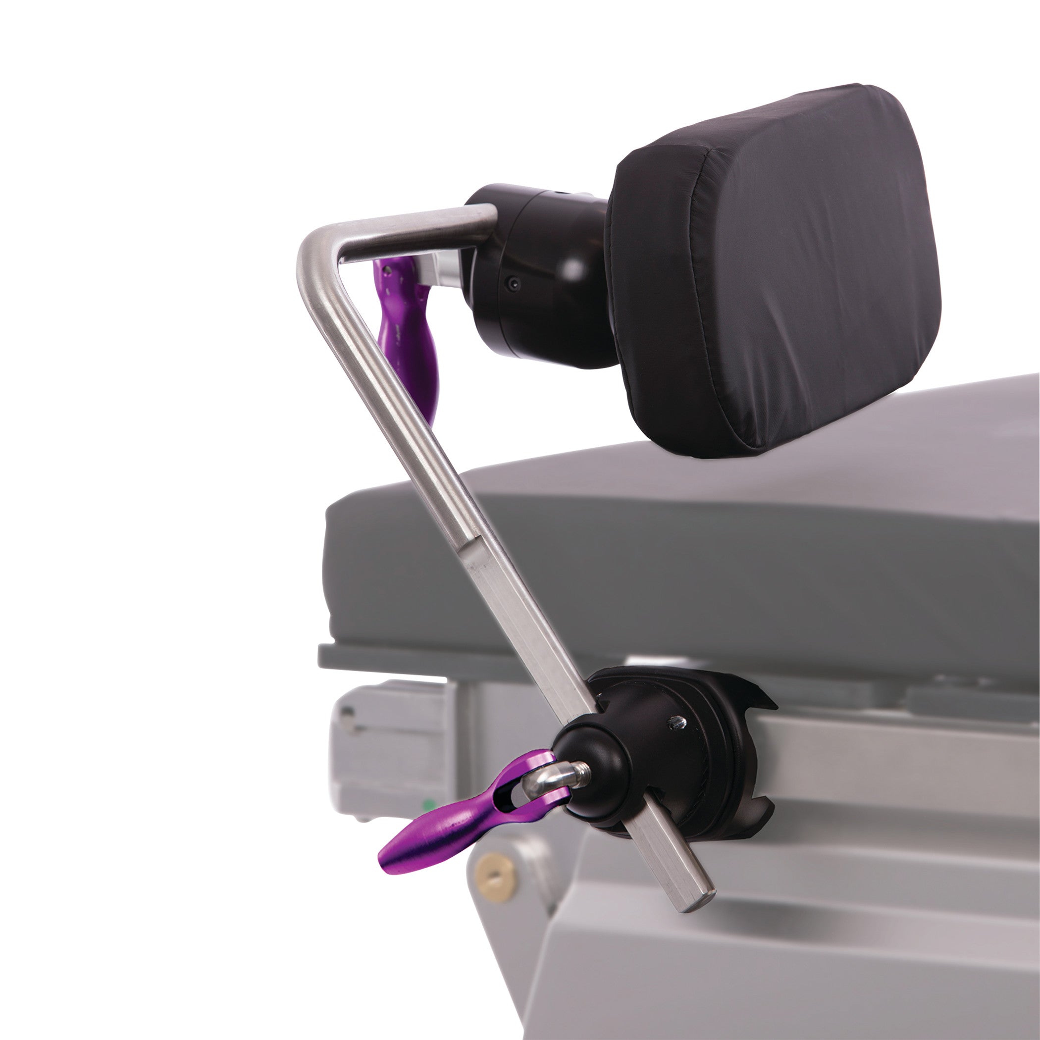 KYRA Secondary Shoulder Support attached to a medical table, featuring a padded black cushion and a silver frame with purple adjustments.